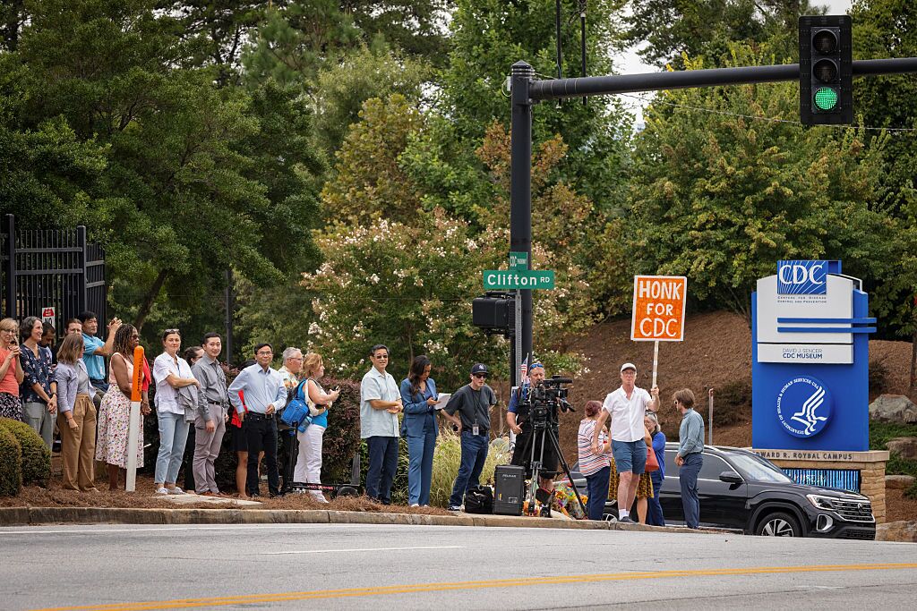 Centers for Disease Control and Prevention staff and supporters protested cuts to the agency outside its headquarters in August. Over this past weekend, hundreds more employees were fired.